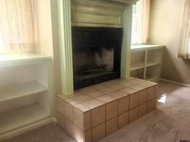 Beautiful chalet style home with Personality plus nestled on two on Holly Lake Ranch Golf Club in Texas - for sale on GolfHomes.com, golf home, golf lot