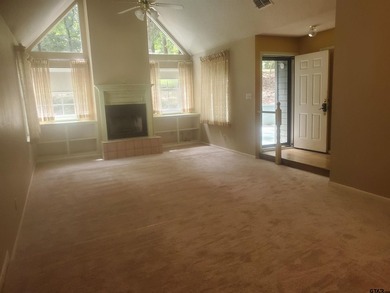 Beautiful chalet style home with Personality plus nestled on two on Holly Lake Ranch Golf Club in Texas - for sale on GolfHomes.com, golf home, golf lot