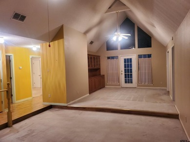 Beautiful chalet style home with Personality plus nestled on two on Holly Lake Ranch Golf Club in Texas - for sale on GolfHomes.com, golf home, golf lot