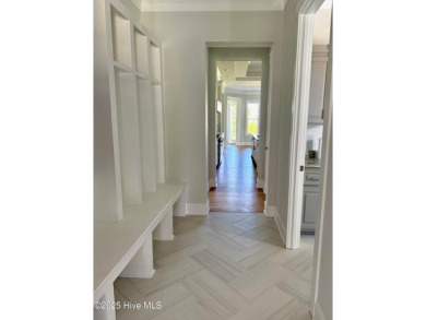 Welcome to luxurious coastal living in the prestigious Reserve on Members Club At St. James Plantation in North Carolina - for sale on GolfHomes.com, golf home, golf lot