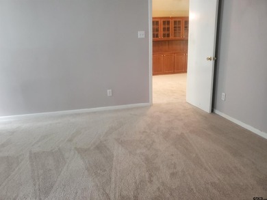 Beautiful chalet style home with Personality plus nestled on two on Holly Lake Ranch Golf Club in Texas - for sale on GolfHomes.com, golf home, golf lot