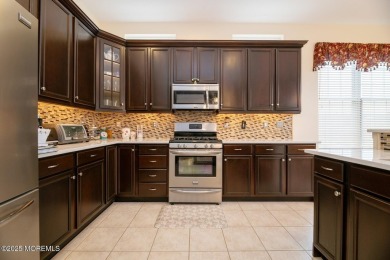 Welcome to maintenance-free living in this Corsica model home on Regency At Monroe Golf and Country Club in New Jersey - for sale on GolfHomes.com, golf home, golf lot