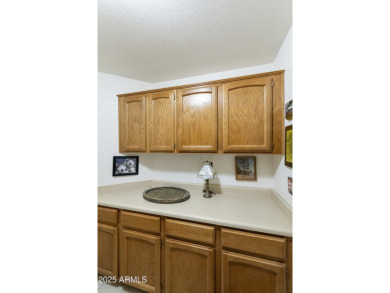 Lovely 1BR plus den w/Murphy bed Sedona model on the walking on Oakwood Golf Club  in Arizona - for sale on GolfHomes.com, golf home, golf lot