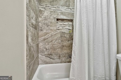 Spectacular & Updated Home in Sought-After SummerGrove close to on Summergrove Golf Club in Georgia - for sale on GolfHomes.com, golf home, golf lot