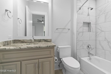 Welcome to luxurious coastal living in the prestigious Reserve on Members Club At St. James Plantation in North Carolina - for sale on GolfHomes.com, golf home, golf lot