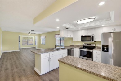 Front porch Water view. Wide Open and bright. Clean. Well on Beacon Woods Golf Club in Florida - for sale on GolfHomes.com, golf home, golf lot