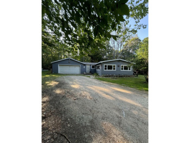 Piece and tranquility with this 3 bedroom 1 3/4 bath home on Drummond Island Golf Course in Michigan - for sale on GolfHomes.com, golf home, golf lot