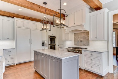 Welcome to 303 Founders Lane, an extraordinary luxury estate on Champions Retreat Golf Club in Georgia - for sale on GolfHomes.com, golf home, golf lot