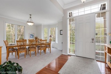 Welcome to 5504 Eagleview Court! This end-unit ranch condo is on Pine Knob Golf Club - Hawk in Michigan - for sale on GolfHomes.com, golf home, golf lot
