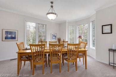 Welcome to 5504 Eagleview Court! This end-unit ranch condo is on Pine Knob Golf Club - Hawk in Michigan - for sale on GolfHomes.com, golf home, golf lot