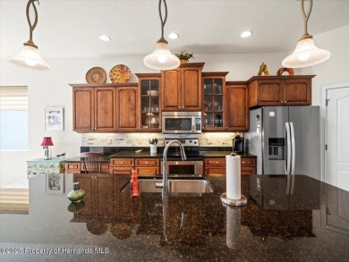 Beautiful 2004 Addison Sandhill Crane pool home situated on a on Glen Lakes Country Club in Florida - for sale on GolfHomes.com, golf home, golf lot