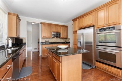 Welcome to 5504 Eagleview Court! This end-unit ranch condo is on Pine Knob Golf Club - Hawk in Michigan - for sale on GolfHomes.com, golf home, golf lot