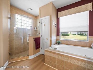 Beautiful 2004 Addison Sandhill Crane pool home situated on a on Glen Lakes Country Club in Florida - for sale on GolfHomes.com, golf home, golf lot
