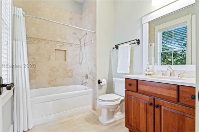 Experience the Lowcountry lifestyle in this custom-built home in on Oldfield Golf Club in South Carolina - for sale on GolfHomes.com, golf home, golf lot