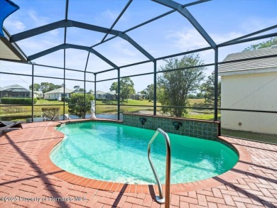 Beautiful 2004 Addison Sandhill Crane pool home situated on a on Glen Lakes Country Club in Florida - for sale on GolfHomes.com, golf home, golf lot