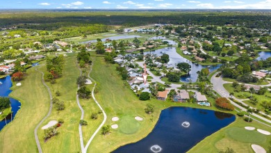 In the heart of Palm Beach Gardens this beautifully updated on Old Marsh Golf Club in Florida - for sale on GolfHomes.com, golf home, golf lot