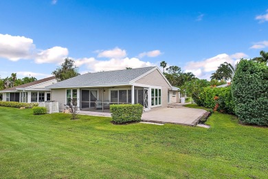 In the heart of Palm Beach Gardens this beautifully updated on Old Marsh Golf Club in Florida - for sale on GolfHomes.com, golf home, golf lot