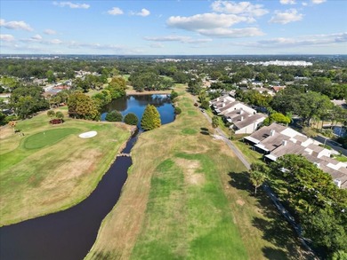 **Welcome Home** to this beautifully updated townhome on Countryside Country Club in Florida - for sale on GolfHomes.com, golf home, golf lot