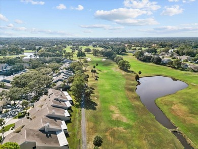 **Welcome Home** to this beautifully updated townhome on Countryside Country Club in Florida - for sale on GolfHomes.com, golf home, golf lot