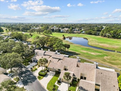 **Welcome Home** to this beautifully updated townhome on Countryside Country Club in Florida - for sale on GolfHomes.com, golf home, golf lot