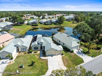 Beautiful 2004 Addison Sandhill Crane pool home situated on a on Glen Lakes Country Club in Florida - for sale on GolfHomes.com, golf home, golf lot