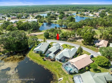 Beautiful 2004 Addison Sandhill Crane pool home situated on a on Glen Lakes Country Club in Florida - for sale on GolfHomes.com, golf home, golf lot