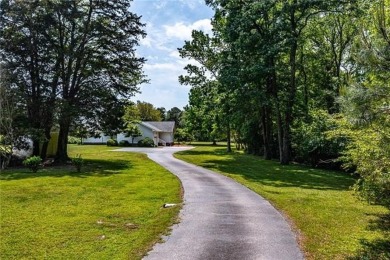 Welcome to 61 Comanchee Lane -- a beautifully maintained on Indian Creek Yacht and Country Club in Virginia - for sale on GolfHomes.com, golf home, golf lot