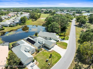 Beautiful 2004 Addison Sandhill Crane pool home situated on a on Glen Lakes Country Club in Florida - for sale on GolfHomes.com, golf home, golf lot