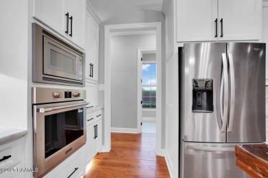 Discover luxury living at its finest in this custom home located on LeTriomphe Golf and Country Club in Louisiana - for sale on GolfHomes.com, golf home, golf lot