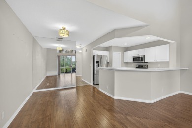 Vacant and move-in ready! This beautifully maintained Golf on BallenIsles Golf and Country Club in Florida - for sale on GolfHomes.com, golf home, golf lot