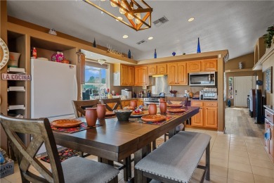 Pool home in Desert Lakes golf course community on a quarter on Desert Lakes Golf Course in Arizona - for sale on GolfHomes.com, golf home, golf lot