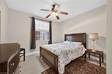 Second floor LAKE VIEW unit with OPEN floor plan with split on Spanish Wells Golf and Country Club in Florida - for sale on GolfHomes.com, golf home, golf lot