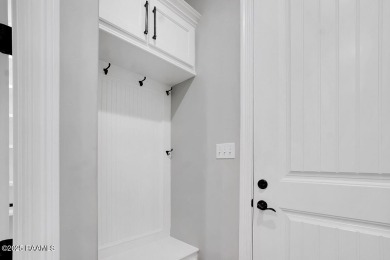 Discover luxury living at its finest in this custom home located on LeTriomphe Golf and Country Club in Louisiana - for sale on GolfHomes.com, golf home, golf lot