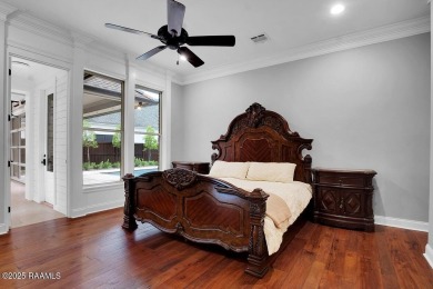 Discover luxury living at its finest in this custom home located on LeTriomphe Golf and Country Club in Louisiana - for sale on GolfHomes.com, golf home, golf lot