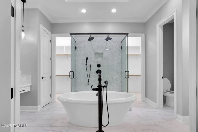 Discover luxury living at its finest in this custom home located on LeTriomphe Golf and Country Club in Louisiana - for sale on GolfHomes.com, golf home, golf lot