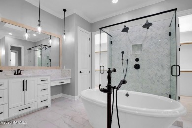 Discover luxury living at its finest in this custom home located on LeTriomphe Golf and Country Club in Louisiana - for sale on GolfHomes.com, golf home, golf lot
