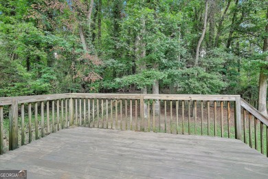 WALK TO LAKE PEACHTREE EVERY EVENING FROM THIS LOVELY RETREAT on Canongate At Flat Creek Club in Georgia - for sale on GolfHomes.com, golf home, golf lot