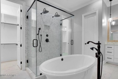 Discover luxury living at its finest in this custom home located on LeTriomphe Golf and Country Club in Louisiana - for sale on GolfHomes.com, golf home, golf lot