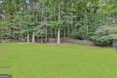 WALK TO LAKE PEACHTREE EVERY EVENING FROM THIS LOVELY RETREAT on Canongate At Flat Creek Club in Georgia - for sale on GolfHomes.com, golf home, golf lot