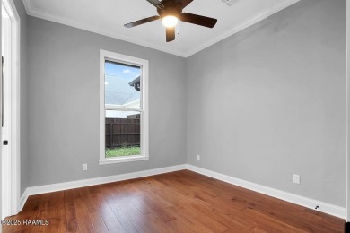 Discover luxury living at its finest in this custom home located on LeTriomphe Golf and Country Club in Louisiana - for sale on GolfHomes.com, golf home, golf lot
