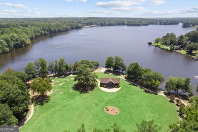 WALK TO LAKE PEACHTREE EVERY EVENING FROM THIS LOVELY RETREAT on Canongate At Flat Creek Club in Georgia - for sale on GolfHomes.com, golf home, golf lot