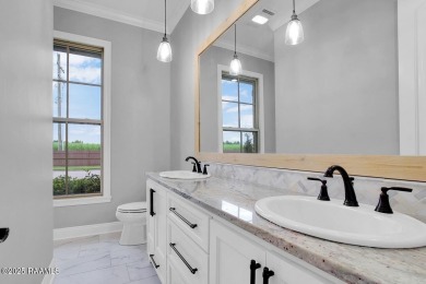 Discover luxury living at its finest in this custom home located on LeTriomphe Golf and Country Club in Louisiana - for sale on GolfHomes.com, golf home, golf lot