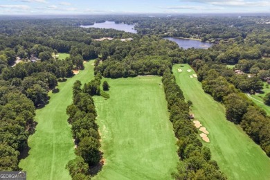 WALK TO LAKE PEACHTREE EVERY EVENING FROM THIS LOVELY RETREAT on Canongate At Flat Creek Club in Georgia - for sale on GolfHomes.com, golf home, golf lot