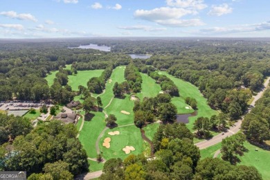 WALK TO LAKE PEACHTREE EVERY EVENING FROM THIS LOVELY RETREAT on Canongate At Flat Creek Club in Georgia - for sale on GolfHomes.com, golf home, golf lot
