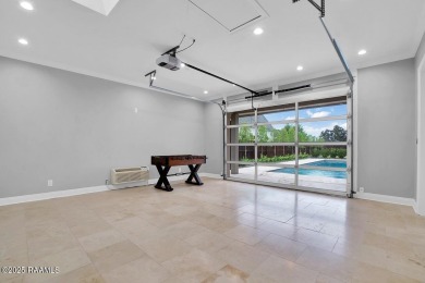Discover luxury living at its finest in this custom home located on LeTriomphe Golf and Country Club in Louisiana - for sale on GolfHomes.com, golf home, golf lot