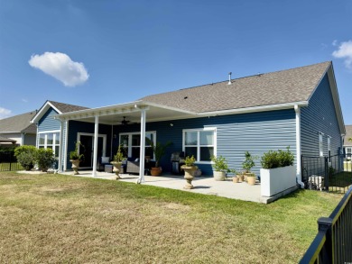 Belle Mer in Surfside Beach blends coastal charm with modern on Wicked Stick Golf Club in South Carolina - for sale on GolfHomes.com, golf home, golf lot