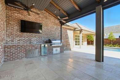 Discover luxury living at its finest in this custom home located on LeTriomphe Golf and Country Club in Louisiana - for sale on GolfHomes.com, golf home, golf lot