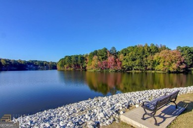 WALK TO LAKE PEACHTREE EVERY EVENING FROM THIS LOVELY RETREAT on Canongate At Flat Creek Club in Georgia - for sale on GolfHomes.com, golf home, golf lot