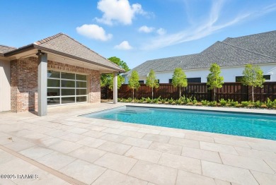 Discover luxury living at its finest in this custom home located on LeTriomphe Golf and Country Club in Louisiana - for sale on GolfHomes.com, golf home, golf lot