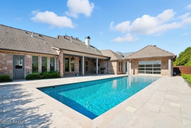 Discover luxury living at its finest in this custom home located on LeTriomphe Golf and Country Club in Louisiana - for sale on GolfHomes.com, golf home, golf lot